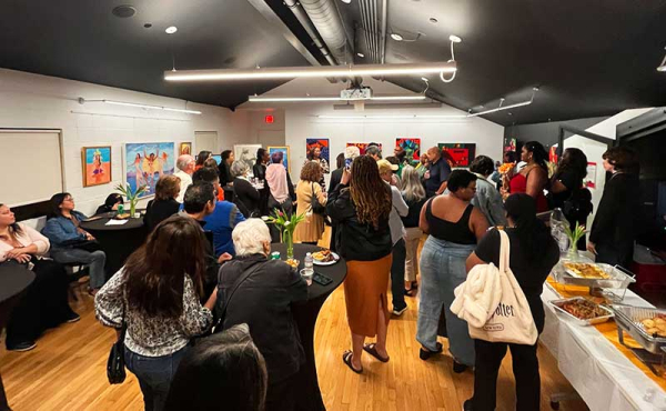 people attending an opening