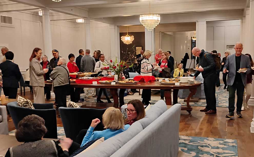 people around a food table