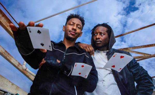 two guys with playing cards