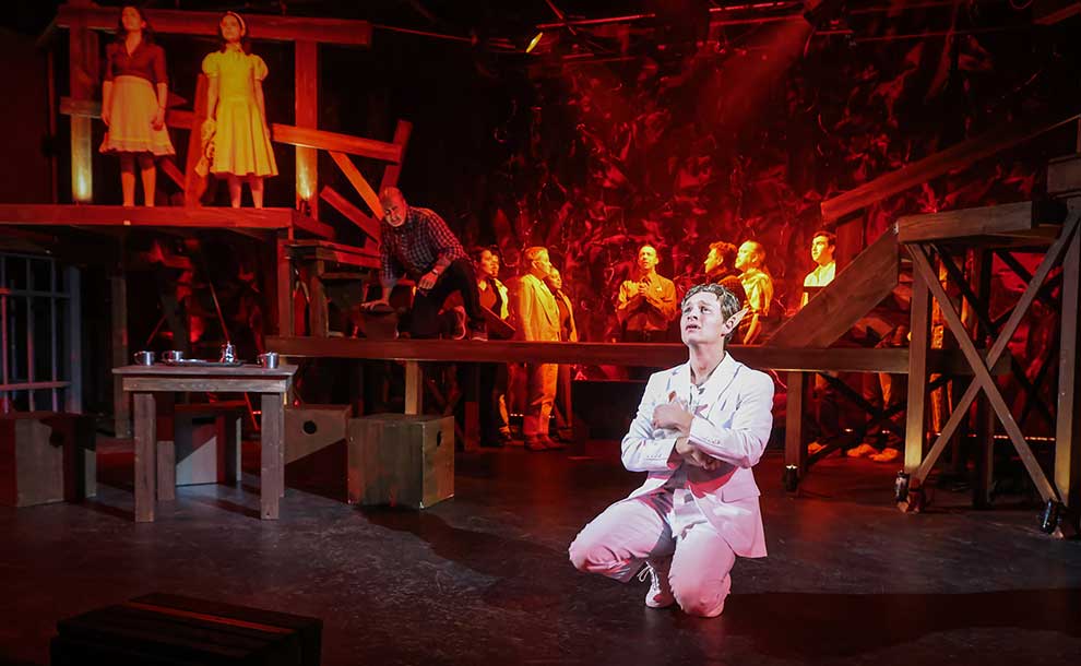 a man in a bat make up