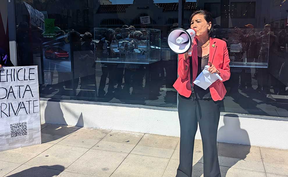 woman speaking to crowd