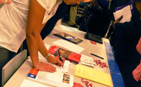 a person filling out a job form