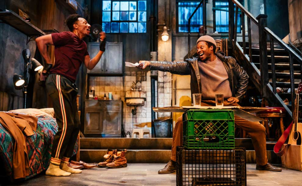 two guys hamming it on stage