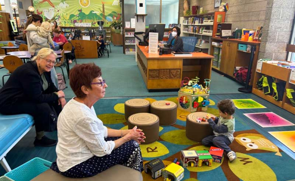 kids and adults at the library