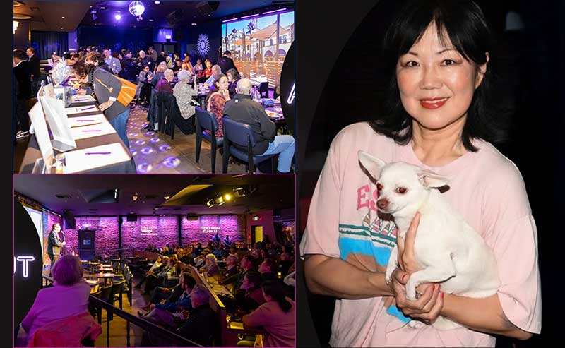 a woman holding a dog