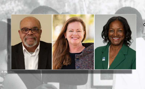 three people smiling