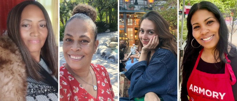 Four women smiling
