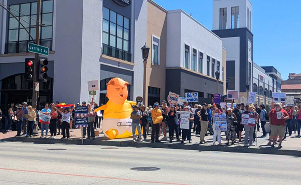 rally with baby T blow doll