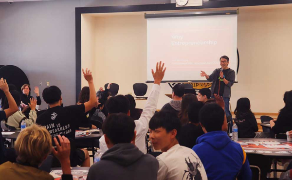 a speaker with students