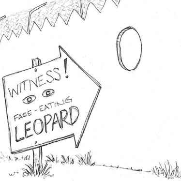 a hole with a sign that instructs people to view face eating leopard