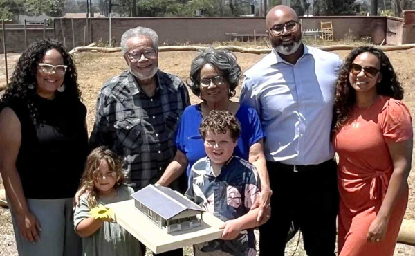 posing for a photo with a home model