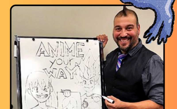 a man showing an Anime drawing board
