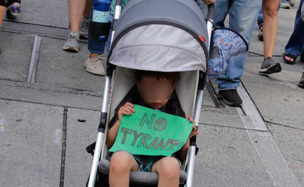 a child with a sign