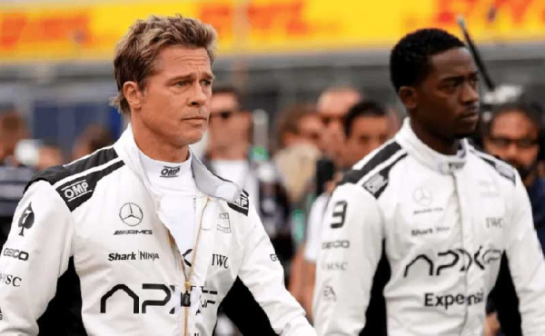 two men in race car uniform