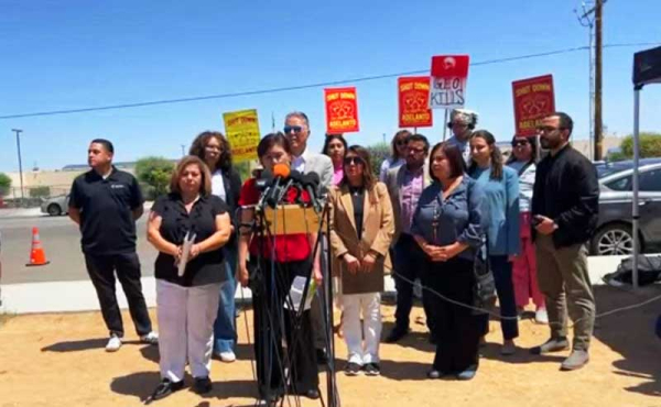 rep speaking with press