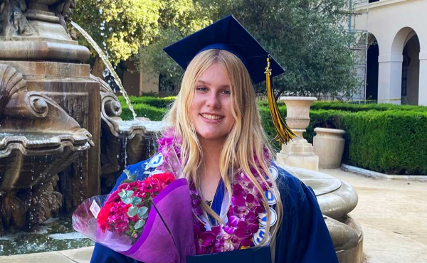 a girl in cap and gown