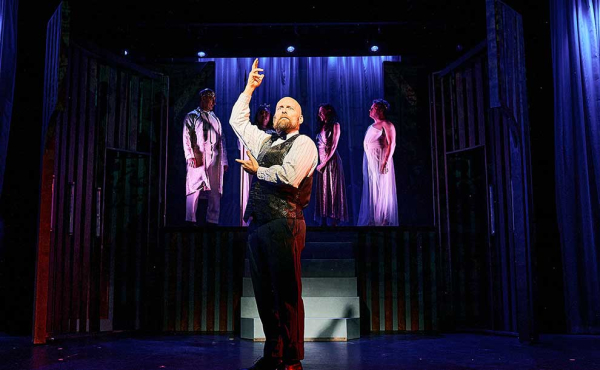 a guy standing on stage