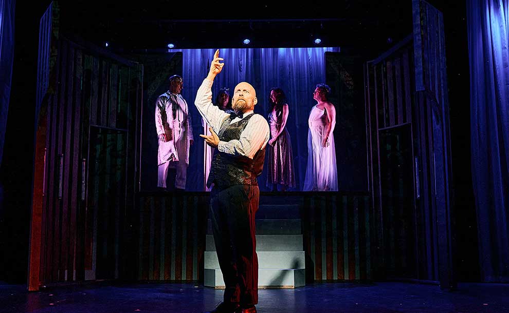 a guy standing on stage