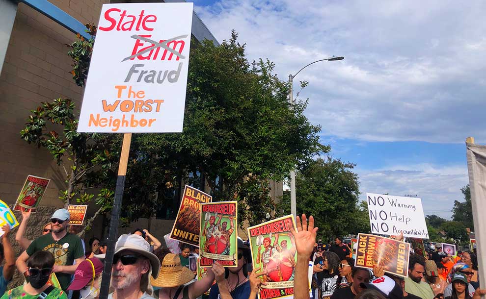 people holding signs