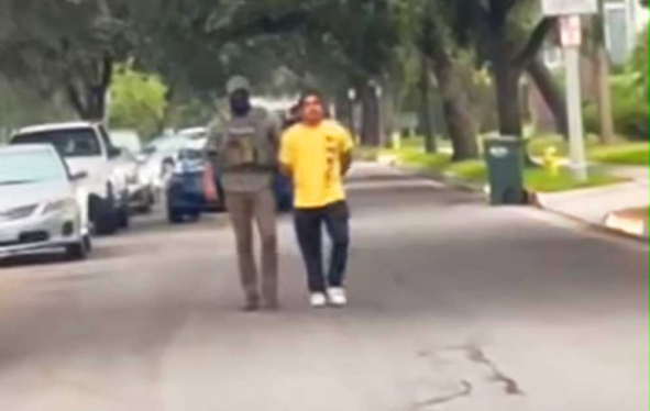 a man and an ICE agent