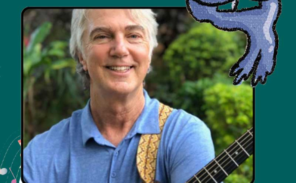 a man playing a guitar