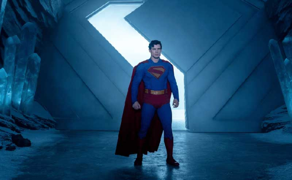 a man wearing a cape