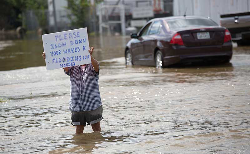 a man holding a sign