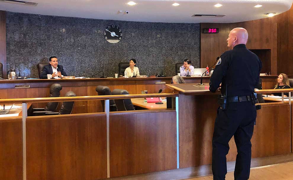 a man with councilmembers