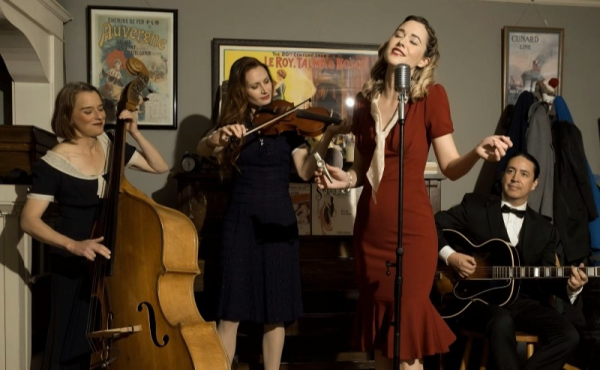 Four musicians with instruments