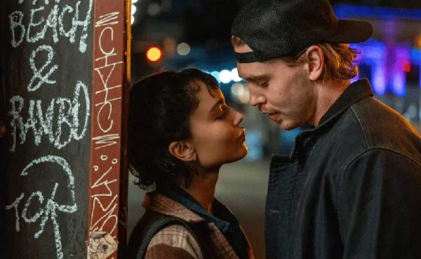 a man and a woman about to kiss