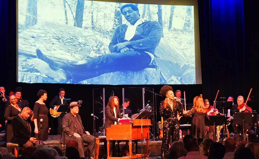 an orchestra and a singer