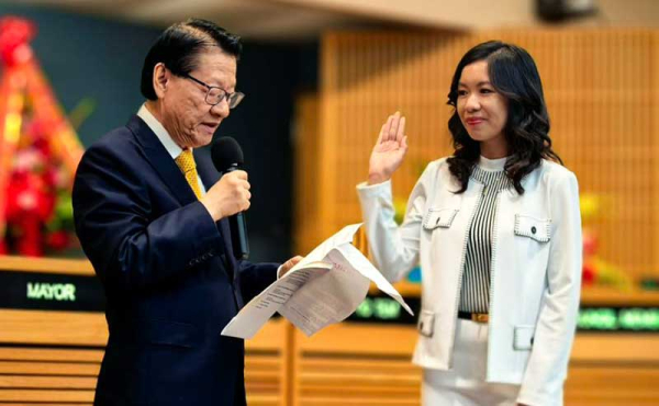 a woman gets sworn in