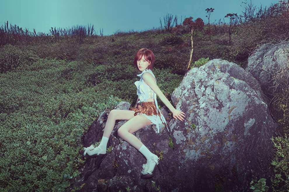 Woman Posing on rock.