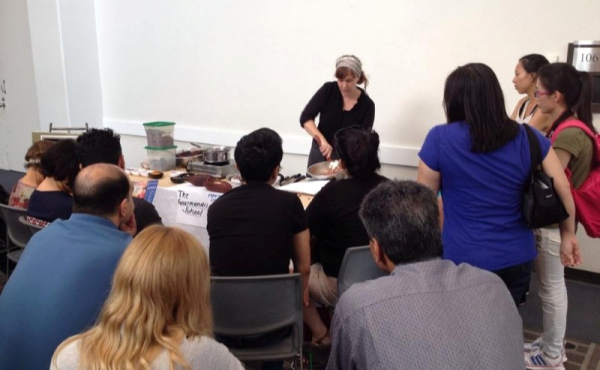 An instructor leading a class on chocolate