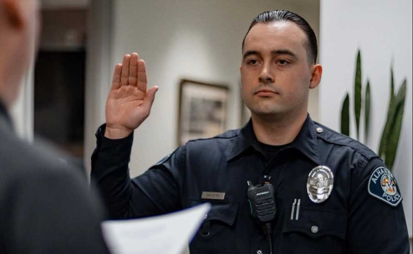 a police officer getting sworn in