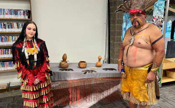 two people posing for camera