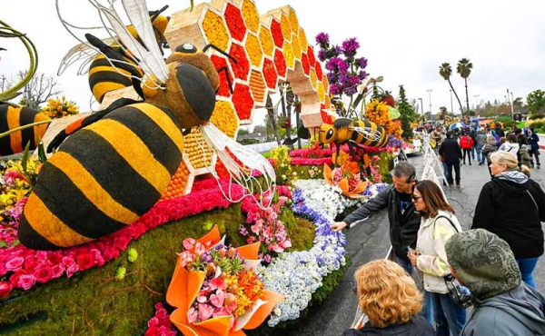 people admiring a float