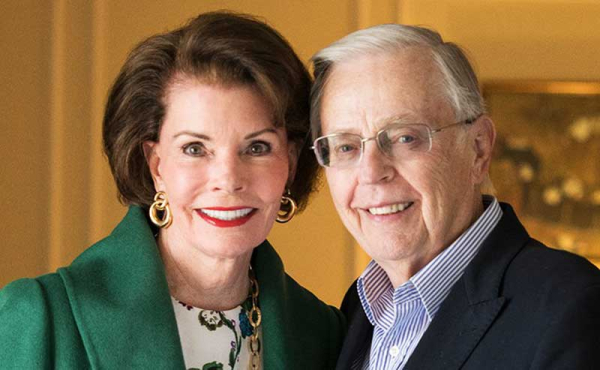 a man and woman smiling