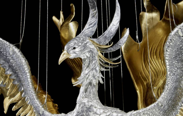 silver body of phoenix with gold feather details