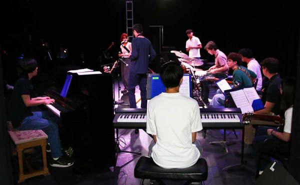 a band rehearsing in stage