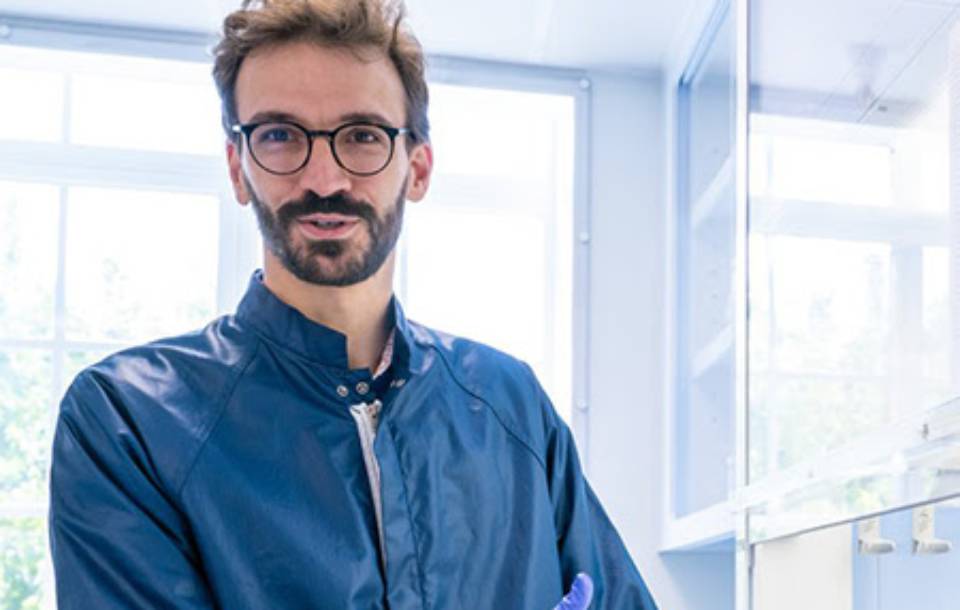 Geochemistry professor Francois Tissot smiles in a lab