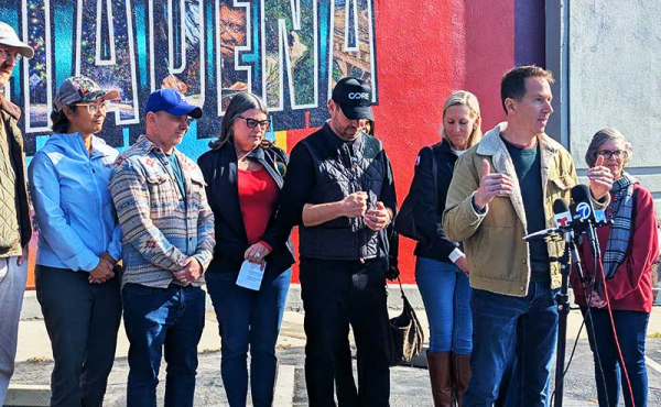 a man speaking at an event
