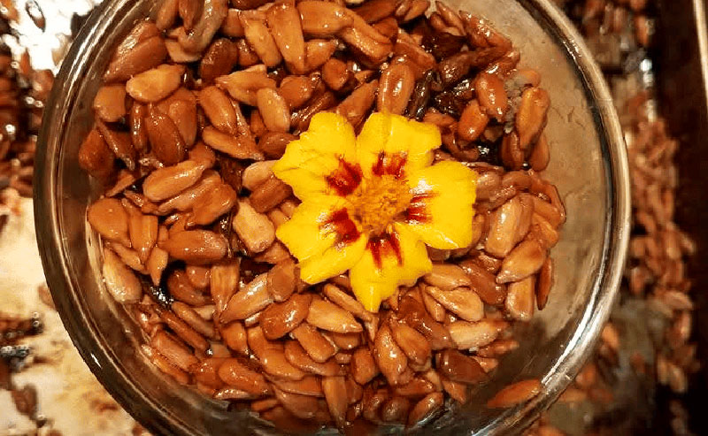 A dish with a flower inside it
