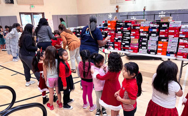 students lining up to get shoes
