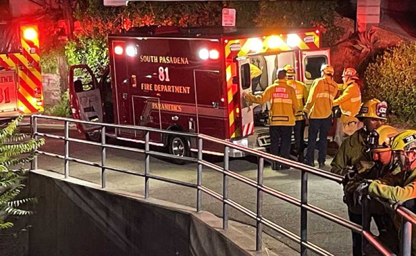 firefighters at a ravine