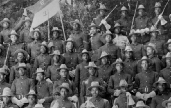 black and white photo of group of Black American soldiers in the 1800s
