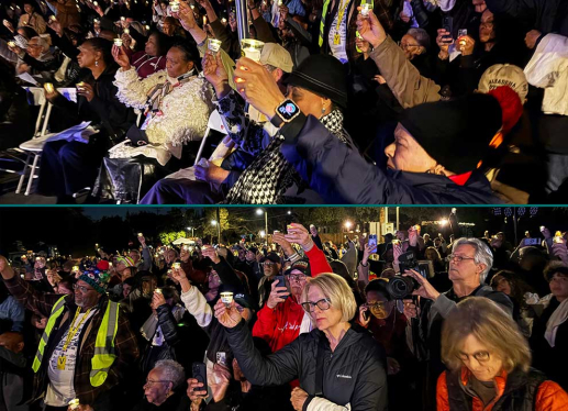 residents holding candles