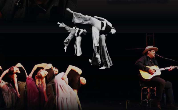 a singer and dancers