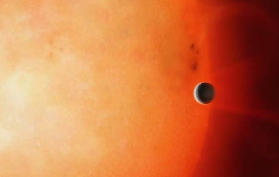 yellow to red planet background with a small moon in foreground