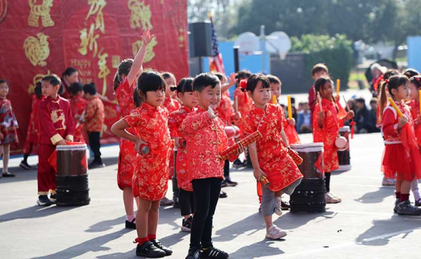 students in traditional clothing